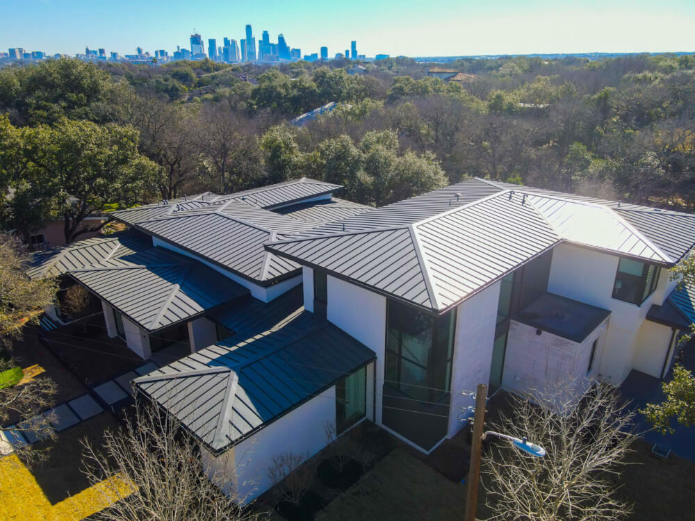 A finished metal roof on a home completed by Texas Roof Repair.